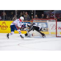 Vancouver Giants Goaltender Trent Miner makes a glove save against the Spokane Chiefs