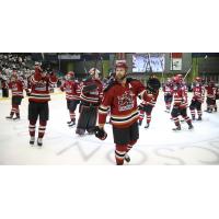 Tucson Roadrunners salute the fans as they leave the ice