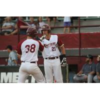 Mike Rojas (38) and Mitch Mallek of the Wisconsin Rapids Rafters