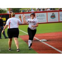 Gwen Svekis of the Chicago Bandits receives a high five while rounding the bases