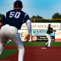 Brazos Valley Bombers throw to first