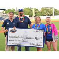 Biloxi Shuckers present a check to Singing River Health System Foundation