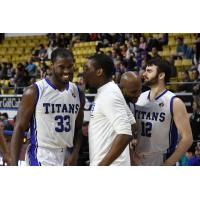 Flenard Whitfield and the KW Titans bench share a laugh