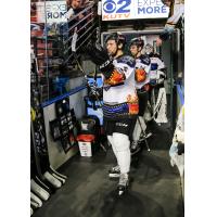 Utah Grizzlies enter the ice in their Guns N Hoses jerseys against the Tulsa Oilers