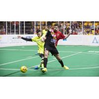 Andrew Hoxie of the Baltimore Blast (right) screens a member of the Milwaukee Wave