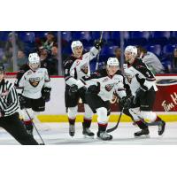 Vancouver Giants defenceman Tyler Bulich and his teammates after a goal