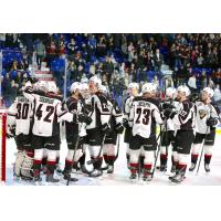 Vancouver Giants exchange congratulations following a win over the Spokane Chiefs