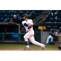 Tim Lopes of the Tacoma Rainiers takes a swing