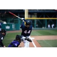 Joey Curletta of the Tacoma Rainiers takes a big swing