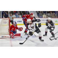 Vancouver Giants right wing Tyler Presiuso handles the puck vs. the Spokane Chiefs
