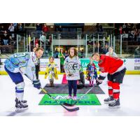 Maine Mariners face-off in their Make-A-Wish jerseys